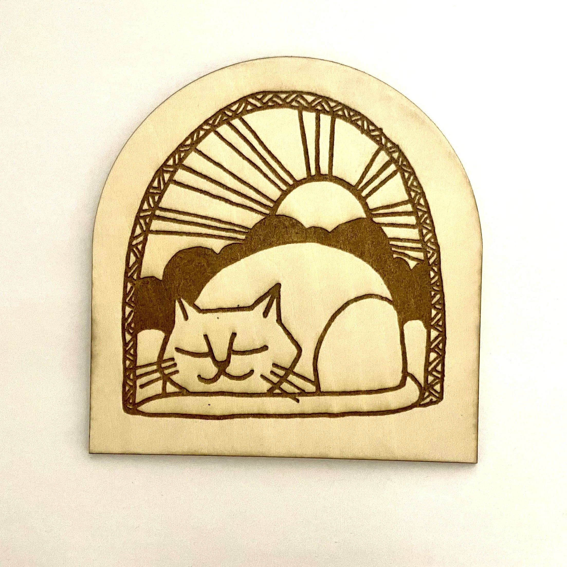 Cat on wooden decoration