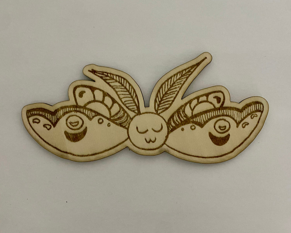 smiley moth on basswood